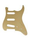 0992143000 Fender Genuine Replacement Part pickguard 57 Vintage Strat, SSS, 8 screw holes, 1-ply, gold anodized