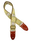 GST-1280-3 Gaucho Authentic Deluxe Series guitar strap, 2" jacquard weave, leather slips with pins, brass buckle, suede backing, yw/gn