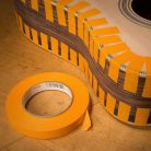 SM0660 StewMac  orange multi-purpose tape, 6,5mm (1/4") wide